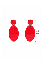 Boucles d'oreilles ovales rouges aux textures rayées