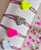 Bracelet cordon rose avec breloque coeur