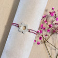 Bracelet cordon coloré avec breloque fleur