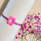 Bracelet cordon coloré avec breloque fleur