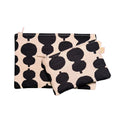 Trousse motifs organiques noirs
