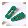 Barrettes vertes texturées
