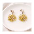 Boucles d'oreilles pendante graphiques jaunes