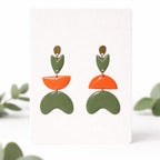 Boucles d'oreilles asymétriques aux formes organiques