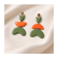 Boucles d'oreilles asymétriques aux formes organiques