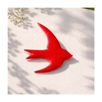 Broche hirondelle rouge pailleté vernis