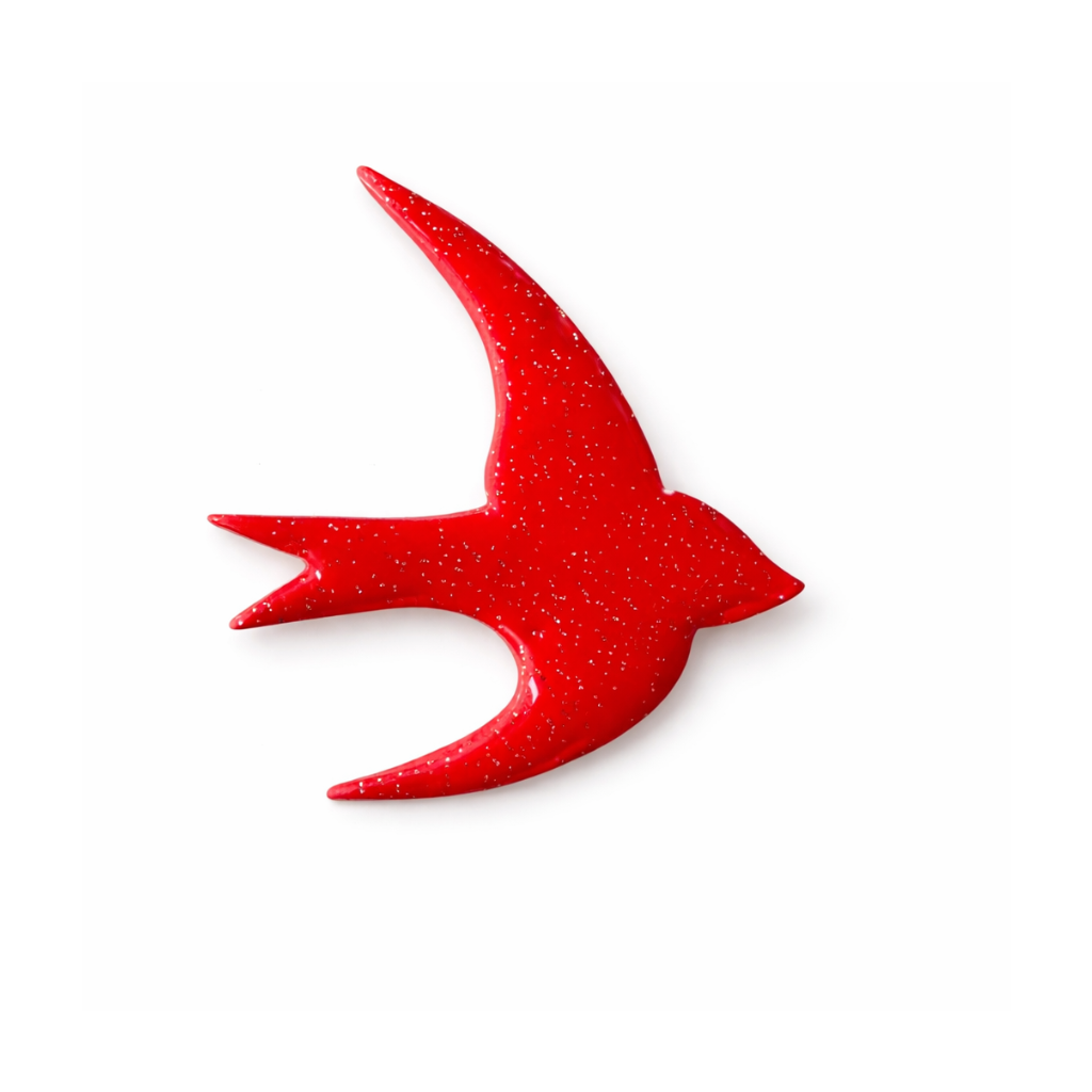 Broche hirondelle rouge pailleté vernis