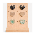 Puces d'oreilles coeurs noirs, beiges et verts