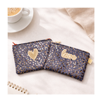 Trousse jean leopard avec écusson
